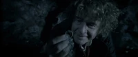 Bilbo discovers the Ring in Gollum's cave.