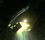 A Malurian shuttle tractoring cargo aboard