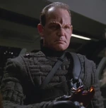 An unnamed Devore scans Neelix