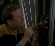 O'Brien attempts to unlock the bar.