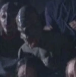 A Repto-humanoid spectator at a Tsunkatse match