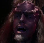 The Klingon prisoner enduring an experiment