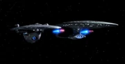 Alongside a Galaxy-class starship