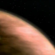 The USS Enterprise-D in orbit of the class H-planet Tau Cygna V