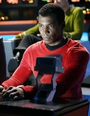 The helmsman on a Constitution-class ship uses a tactical scope during battle