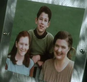 Morica and her two children.