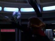 An alien closes on Janeway