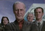 Zefram Cochrane et Henry Archer lors de l'inauguration du Complexe de Distorsion 5 en 2119.
