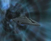 Le USS Voyager navigue dans le sillage quantique.