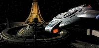 De USS Defiant verlaat Deep Space 9.