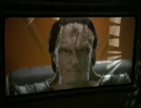 Dukat kondigt aan dat Cardassia zich bij de Dominion heeft gevoegd.