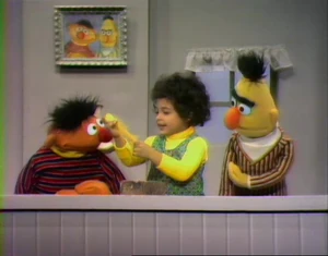Ernie, Bert and Shola discuss "heavy" and "light".