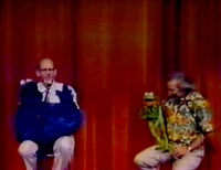 Oz with Cookie Monster and Henson with Kermit.