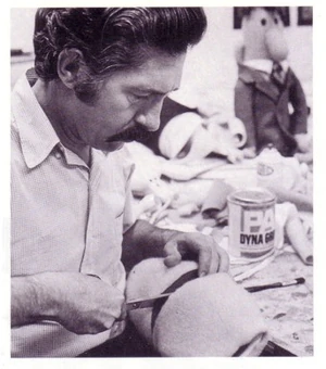 Don Sahlin carving a character's mouth, prior to adding the "magic triangle"