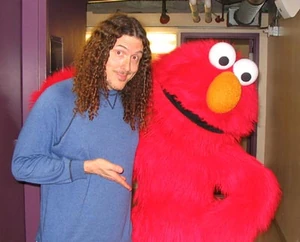 Weird Al and Elmo backstage at Sesame Street Live at the Kodak Theatre in Los Angeles (2005).