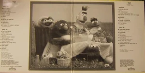 The inside of the album cover has an old picture of some of the Vicma puppets.