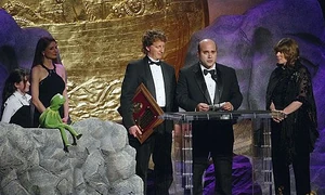 Karle Warren, Heather Chase, Kermit the Frog, David Gumpel, Michael Polis and Ritamarie Peruggi.
