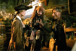 Elizabeth in Tortuga with Jack and Ragetti.