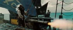Jack Sparrow using a cannon to escape HMS Endeavour.