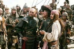 (L to R) Chow Yun-Fat as Captain Sao Feng, Geoffrey Rush as Captain Barbossa and Johnny Depp as Captain Jack Sparrow
