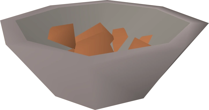 A detailed view of a panning tray containing plain mud