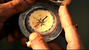 Lex uses the more weathered compass after the crash