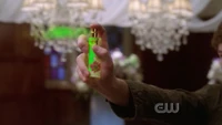 Chloe uses a kryptonite spray against Lois.