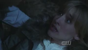 Chloe is shot and dies.