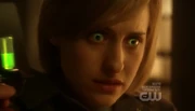Chloe is injected with a serum.