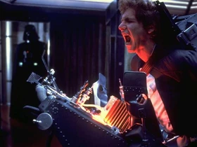 Han Solo being tortured by Darth Vader.