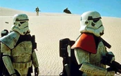 A platoon leader with the orange pauldron of an officer.