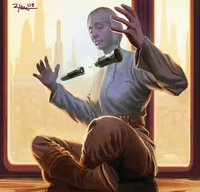 A Jedi student constructs her lightsaber.