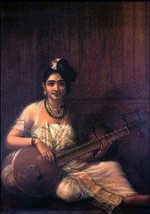 A woman with Vina, a musical instrument