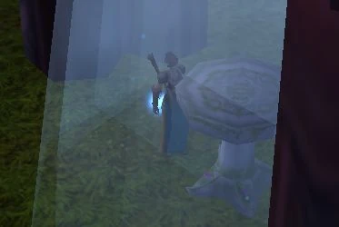 Paia wearing a robe which was a quest reward. She wears it when not in combat.