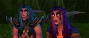 Kayuna and Mia, seen in the light of a campfire.