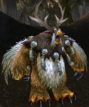 A Night Elf and a Tauren in Moonkin Form