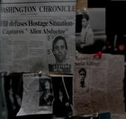 The article about Tooms  and photograph of him on Mulder's wall