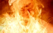 The Cigarette-Smoking Man's skin is seared off in a blaze caused by missiles fired from black helicopters.