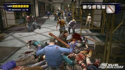 Frank attacks zombies with a 2x4.